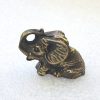 Éléphant assis de collection en métal fabrication française