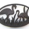 Dessous de plat flamants ou décoration en fonte