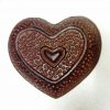 Cache clé coeur en fonte