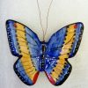 Petit papillon en céramique peint à la main
