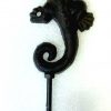 Crochet salamandre en fonte et porcelaine