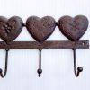 Porte manteau coeur en fonte