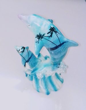 dauphins bleus en plein saut statuette / sujet à poser