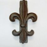 Heurtoir/marteau de porte fleur de lys décorative en fonte